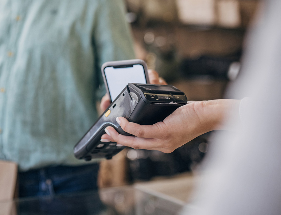 a person making a purchase with their phone